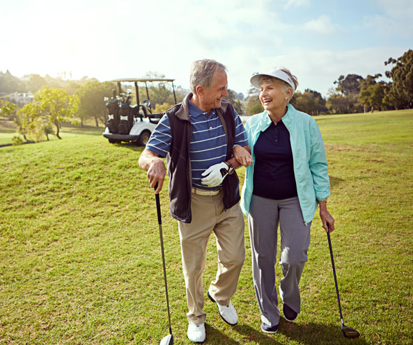 Older couple on golf course