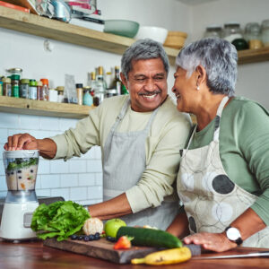 Shot of a senior couple preparing a healthy smoothie in the kitchen at home